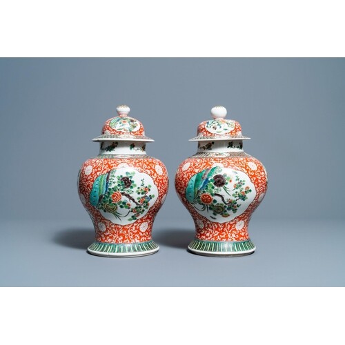 A pair of Chinese famille verte vases and covers, 19/20th C....