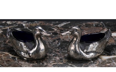 A pair of Edwardian silver novelty salts, as ducks, 9cm long...
