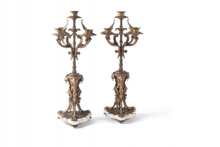 A pair of French gilt bronze and white marble mounted five light candelabra, last quarter 19th century