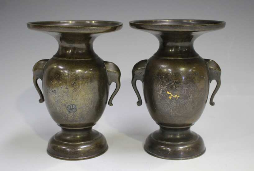 A pair of Japanese wire inlaid brown patinated bronze vases, Meiji/Taisho period, each ovoid body de