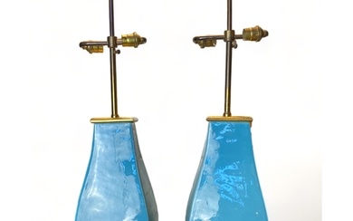 A pair of Mallets 20th century light blue ceramic twin-light...