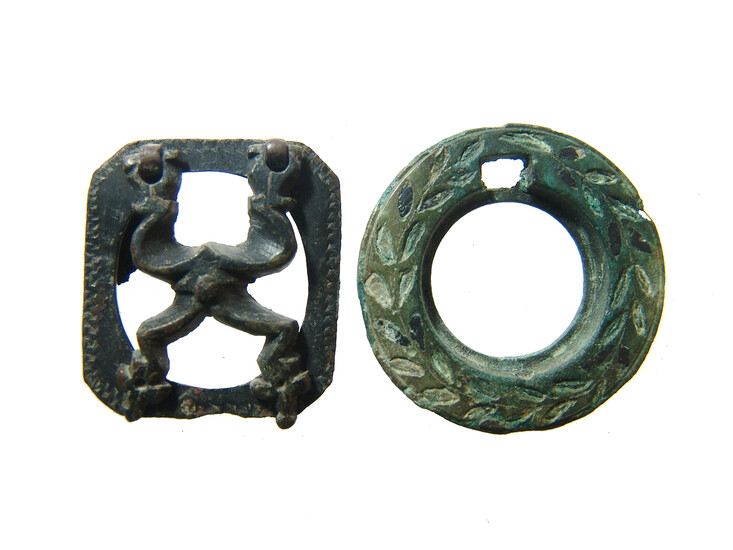 A pair of Roman & Persian bronze inkwell lids