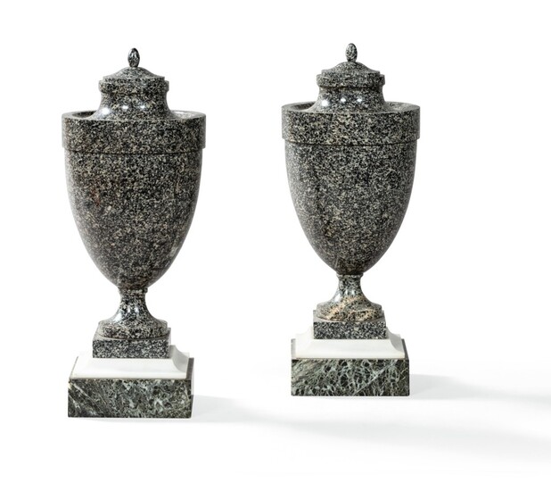 A pair of porphyry vases and covers, first half 19th century | Paire de vases couverts en porphyre, première moitié du XIXème siècle