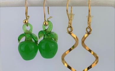 A pair of yellow metal twist drop earrings, L. 5cm together with a pair of apple shaped glass drop earrings on a hallmarked 9ct yellow gold