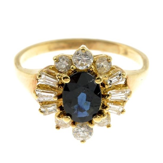 A sapphire and diamond cluster ring.Estimated total diamond...