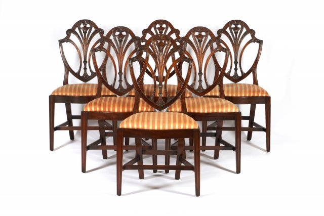 A set of twelve Hepplewhite style chairs