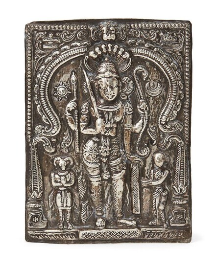 A silver repousse plaque depicting Shiva in the form of Virabhandra, India, 19th century, of rectangular form, shown standing with four hands in which he holds a bow, an arrow or a staff, a sword and a shield16.5 x 12.1cm., 93 grams Daksha, whose...