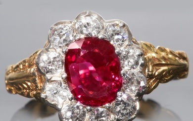 ANTIQUE RUBY AND DIAMOND CLUSTER RING. Gemstones totalling a...