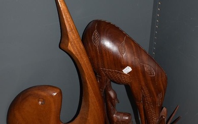 An African carved hardwood antelope and calf, measuring 45cm tall, another large carved wooden