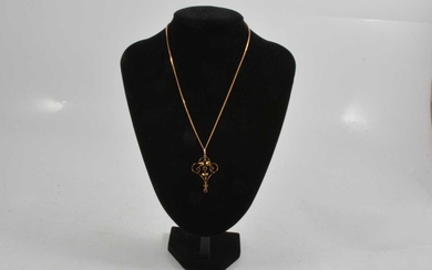 An Edwardian style pendant and chain.