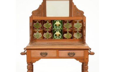 An early 20th c waxed pine washstand, the tiled back with b...