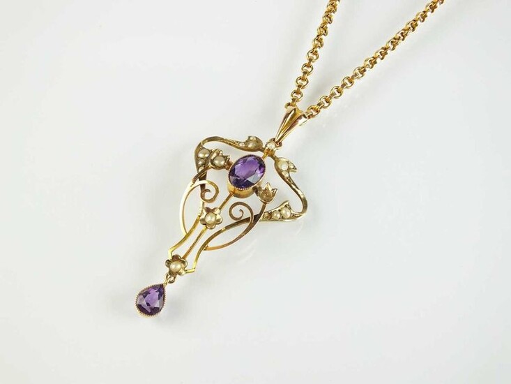 An early 20th century amethyst and seed pearl pendant, designed...