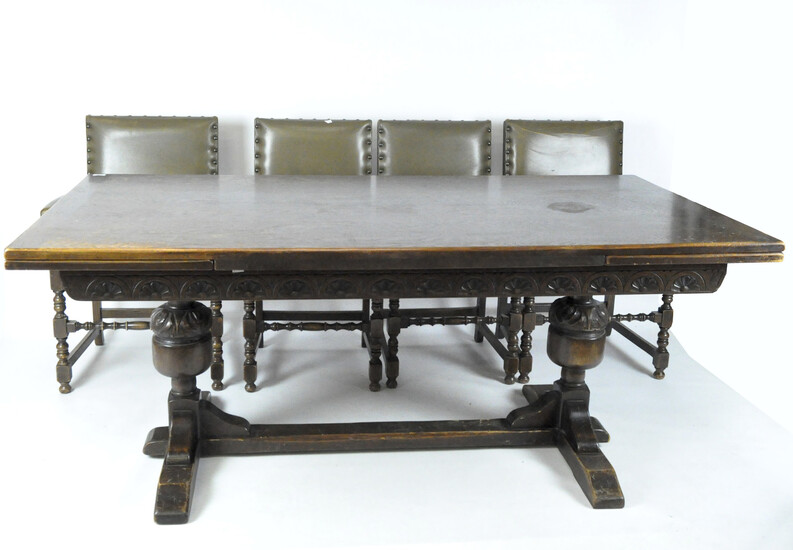 An early 20th century extendable wooden refectory table