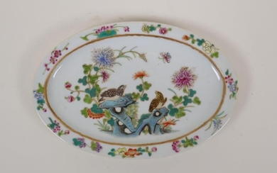 An early C20th polychrome porcelain oval dish with enamel...
