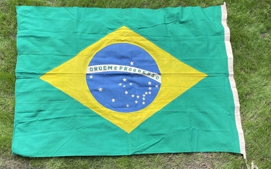 [BRAZIL]: A World War II date national flag of Brazil (measuring 71.5 x 50.5''), the Verde e amarela...