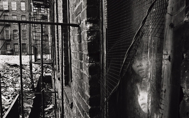 BRUCE DAVIDSON (1933- ) East 100th Street. Silver print, the image measuring 7⅝x7⅜...