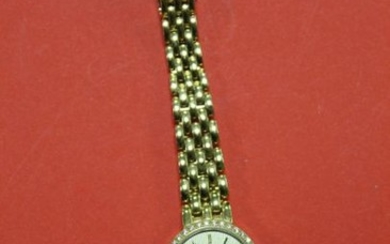 Bracelet montre de Dame, or jaune, diamants, poids...