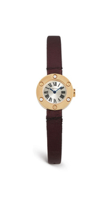Cartier. A yellow gold and diamond-set Wristwatch