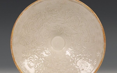 China, saucer in Sung style, with relief of...