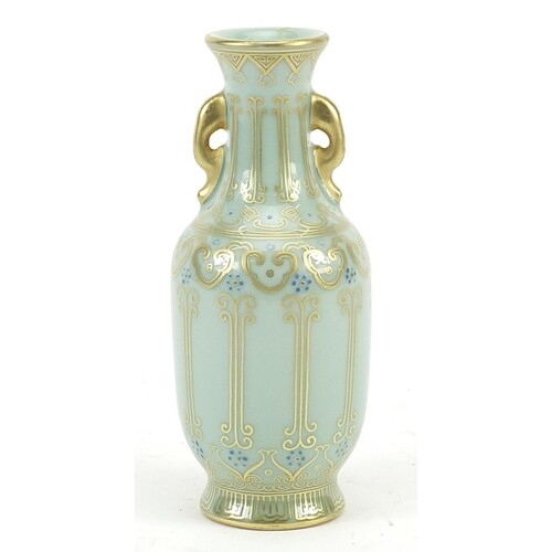 Chinese celadon glaze porcelain vase with elephant head hand...