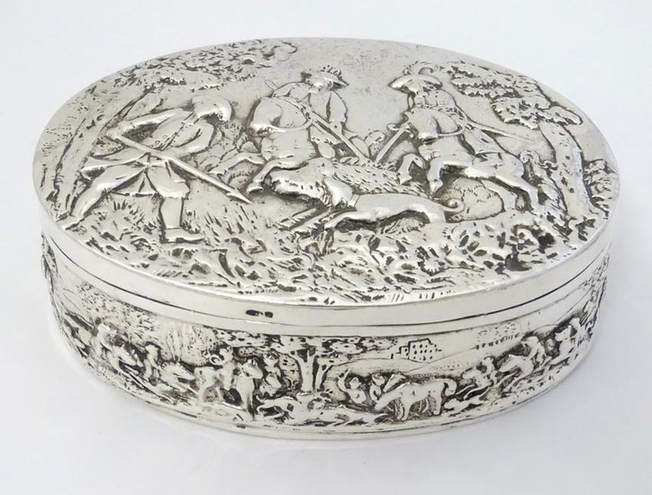 Continental silver table box of oval form profusely