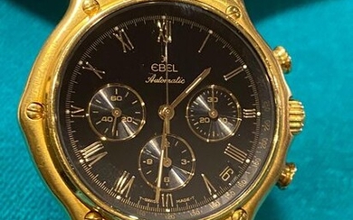 EBEL. 750°/°° gold watchband, automatic chronograph, black dial, three counters,...