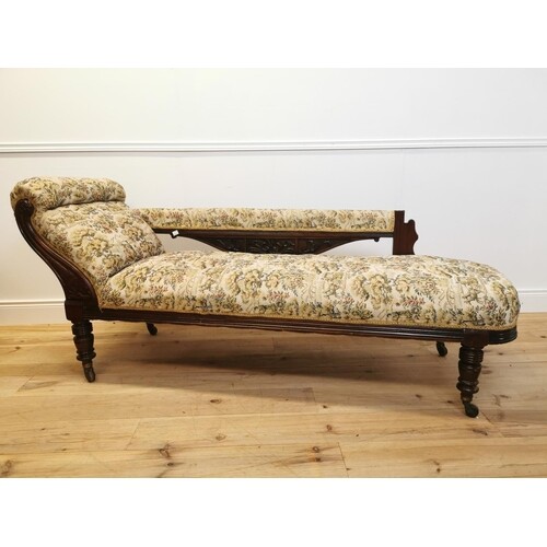 Edwardian upholstered mahogany single ended sofa raised on t...