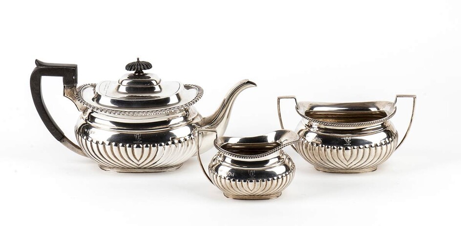 English sterling silver three pieces tea set - London...