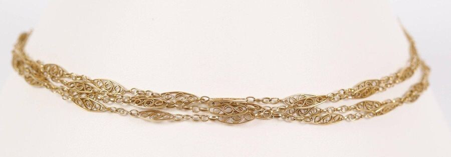 Gold filigree long necklace (750). L: 150 cm, Weight: 15.8 gr.
