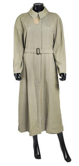 HERMÈS Trench-coat réversible en laine et coton kaki (taille 34) Reversible trench coat in khaki wool and cotton (size 34)...