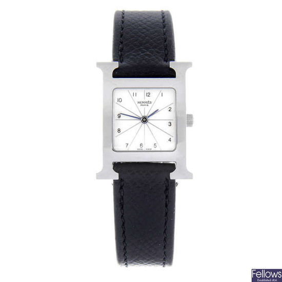 HERMÈS - a lady's stainless steel Heure H wrist watch.