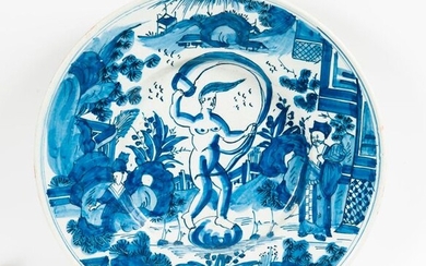 In the taste of Delft or Nevers, Round earthenware dish with Venus blue monochrome decoration.