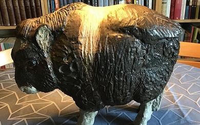 SOLD. Jeanne Grut: An earthenware figure modelled in the shape of a musk ox calf. Decorated with brown, black and white glaze. Made by Aluminia. H. 35 cm. L. 40 cm. – Bruun Rasmussen Auctioneers of Fine Art