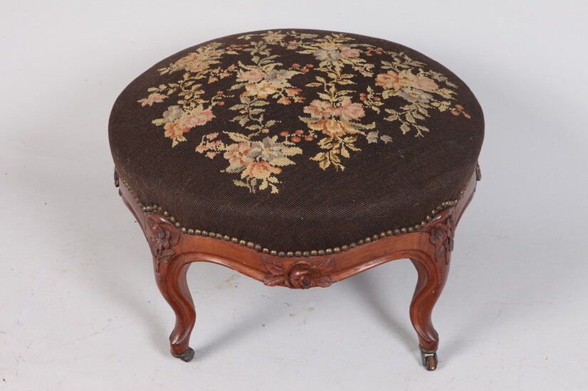 LOUIS XV CARVED WALNUT CIRCULAR-TOP OTTOMAN WITH FLORAL NEEDLEPOINT TOP,...