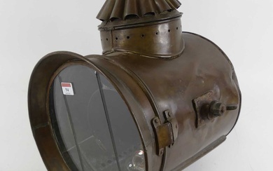 Lot details An early 20th century copper ship's spotlight, bearing...