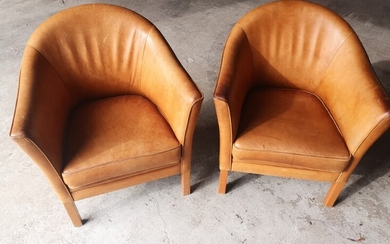 SOLD. Mogens Hansen: Two lounge chairs model MH 80 upholstered with light brown leather, beech...