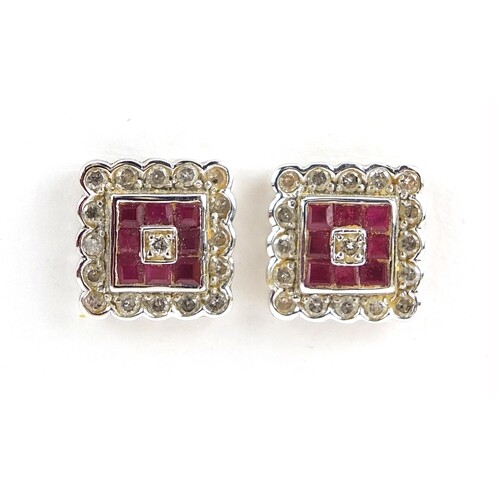 Pair of 18ct white gold ruby and diamond square cluster stud...