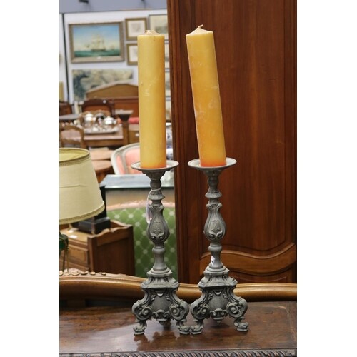 Pair of French heavy cast pewter candlesticks with candles, ...