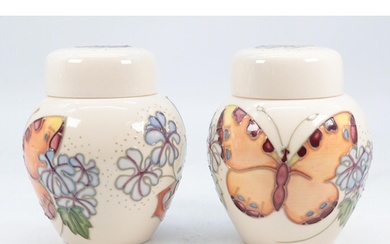 Pair of boxed Moorcroft ginger jars decorated with butterfli...