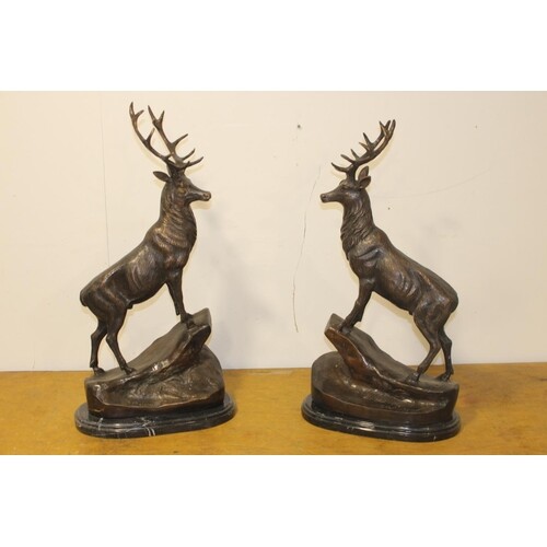 Pair of good quality bronze stags mounted on marble bases {7...