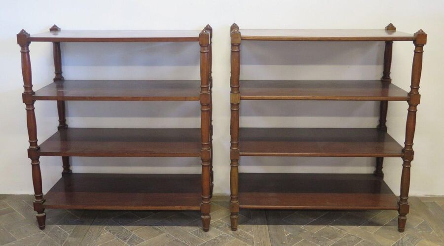 Pair of mahogany and mahogany veneer shelves.
