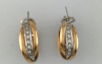 Pair of twisted creoles 2 gold750°/°°° with a line of diamonds, Gross weight: 12,10g