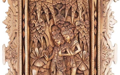 Pannello in legno esotico intagliato ad altorilievo