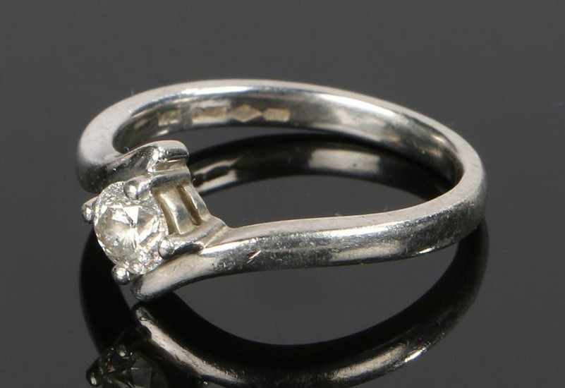 Platinum and diamond set ring, the head with a round