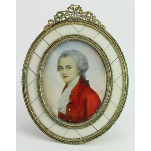 Portrait miniature. W A Mozart. In a brass and bone oval fra...
