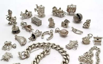 Qty of silver charms + 2 bracelets inc donald duck playing s...