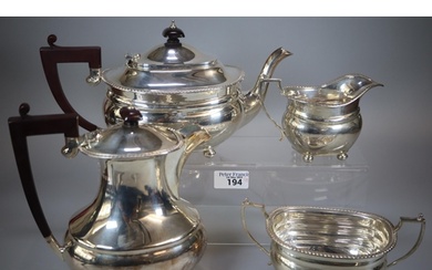 Queen Elizabeth II silver tea service comprising: teapot, tw...