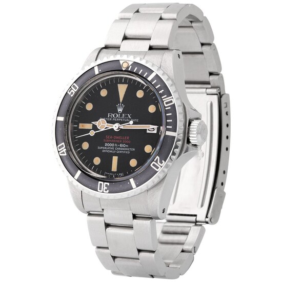 Rolex. Sought after and Desired Sea Dweller “Double Red” Automatic Wristwatch in Steel, Reference 1665, With Black Dial and original Warranty