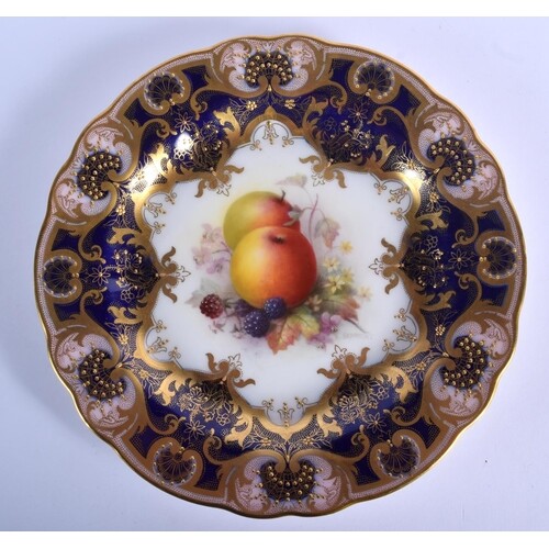 Royal Worcester plate finely painted with fruit under a blue...
