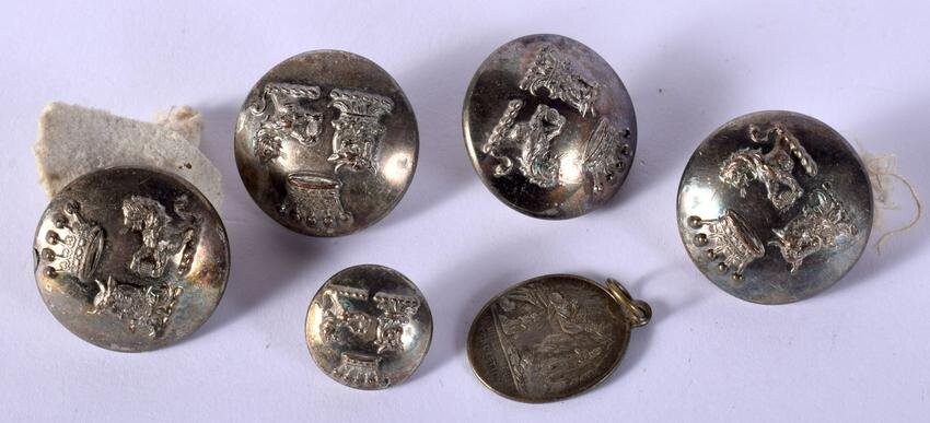 SIX MILITARY BUTTONS. 37 grams. Largest 2.5 cm wide.